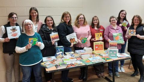 Home visiting coalition donating books